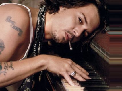 Johnny Depp Text Tattoo On Right Arm